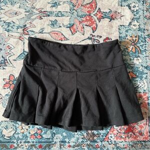Black mini tennis skirt
